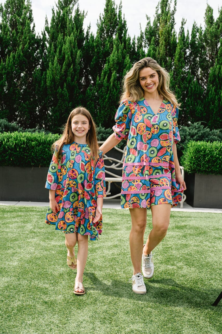 Woman and girl wearing Briton Court dress