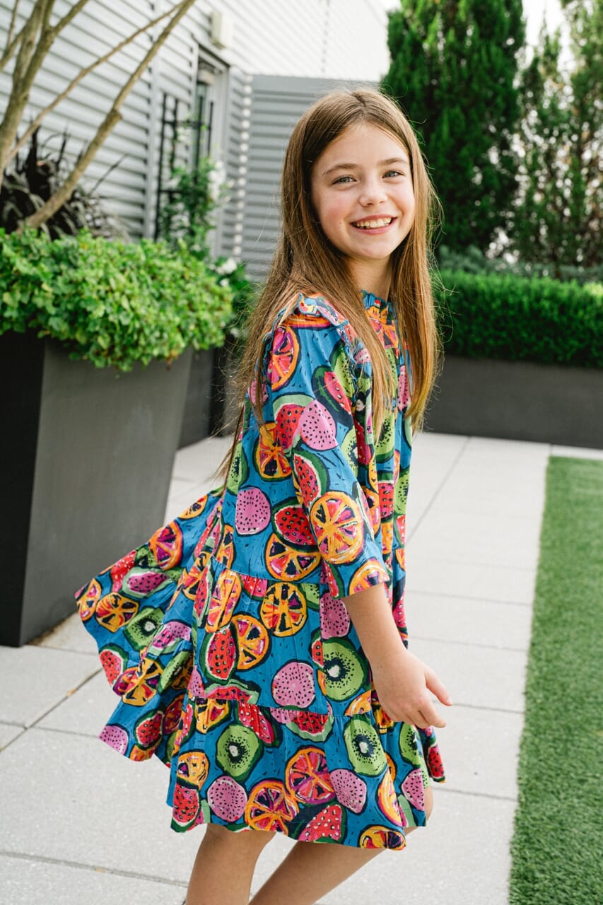 Girl wearing Briton Court dress.