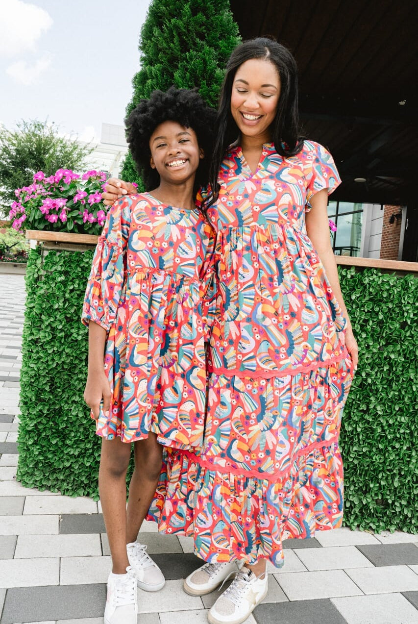 Woman and girl wearing Briton Court dress.