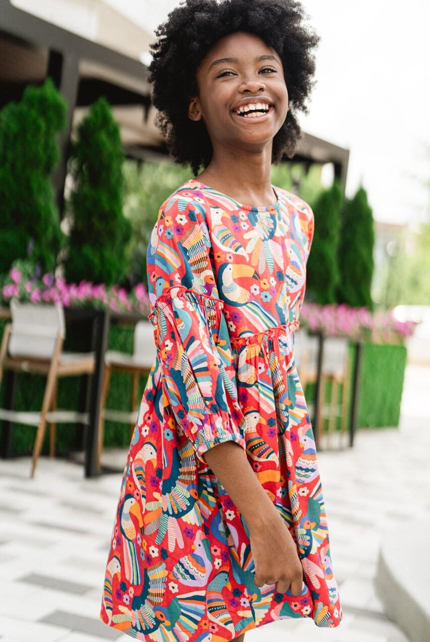Girl wearing Briton Court dress.