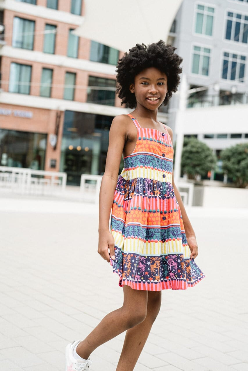 girl wearing printed dress - briton court
