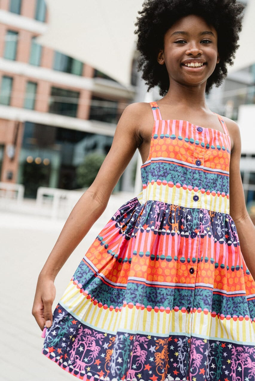 girl wearing printed dress - briton court