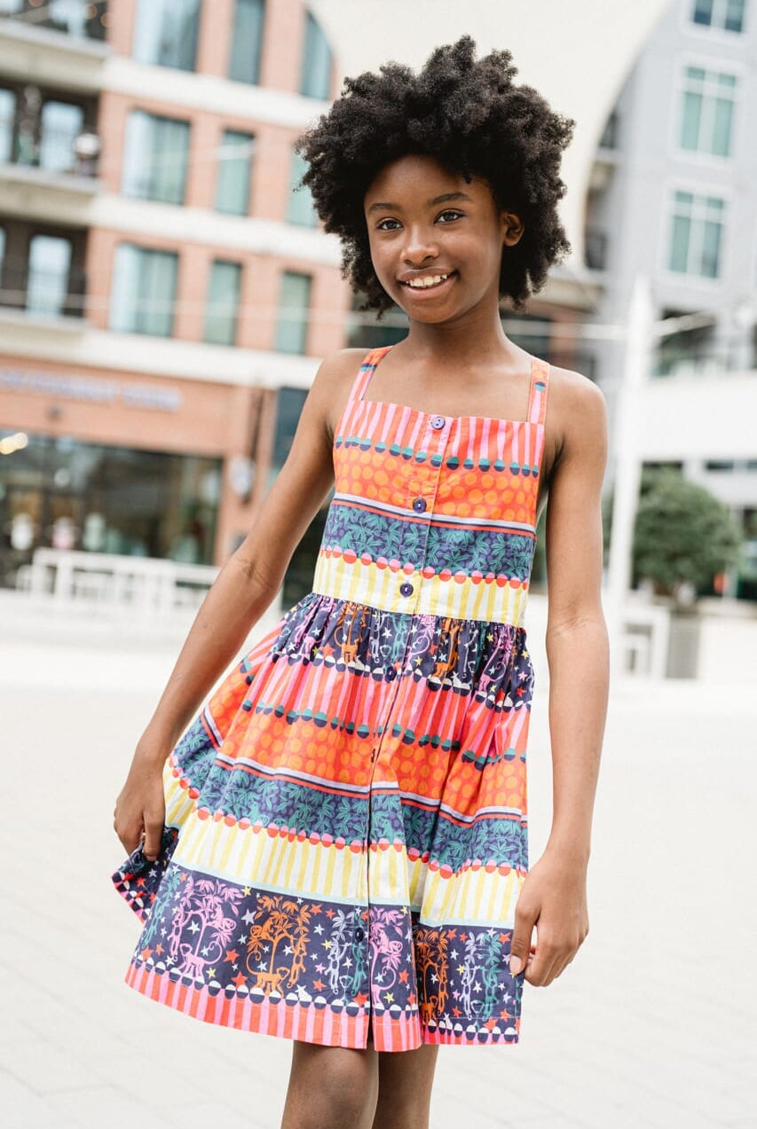 girl wearing printed dress - briton court