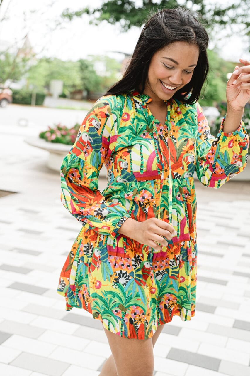 woman wearing printed mini dress - briton court