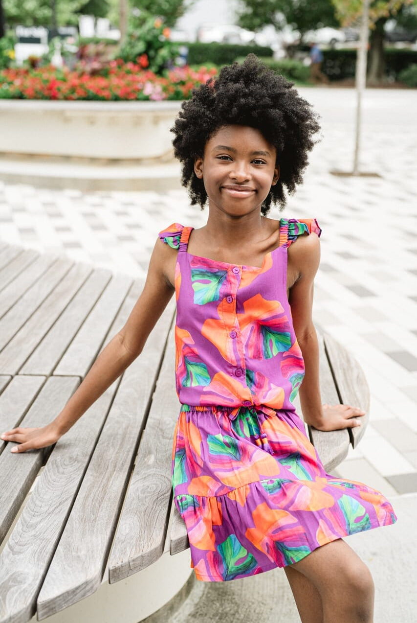girl wearing printed top and skirt - briton court