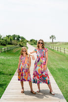 Woman and girl wearing Briton Court dresses.