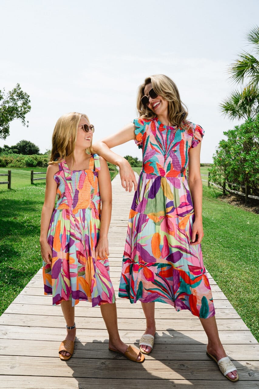 Woman and girl wearing Briton Court dresses.