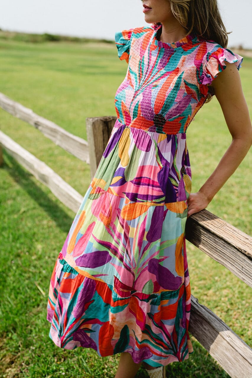 Woman wearing Briton Court dresses.