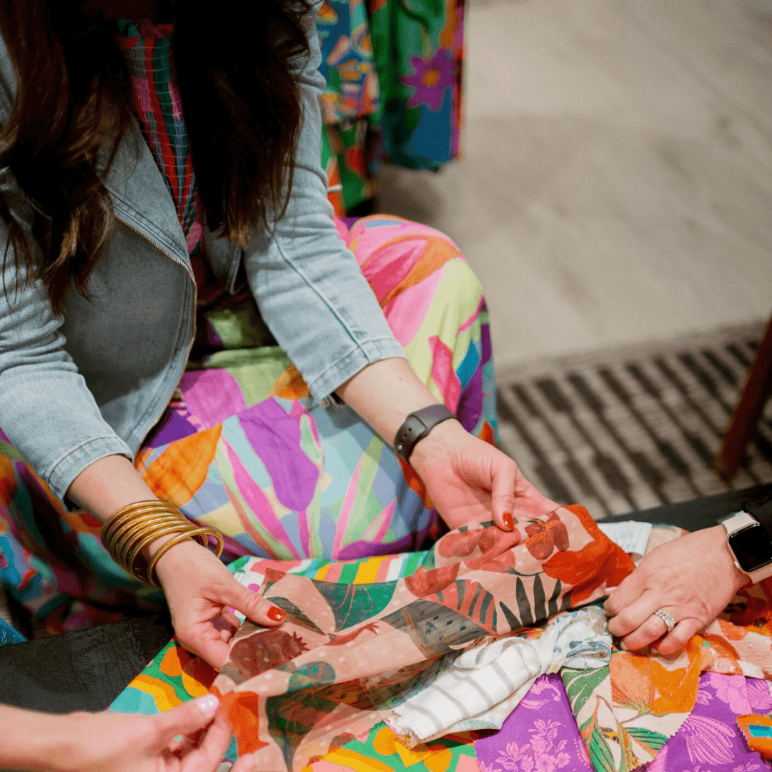 Hands touching fabric 