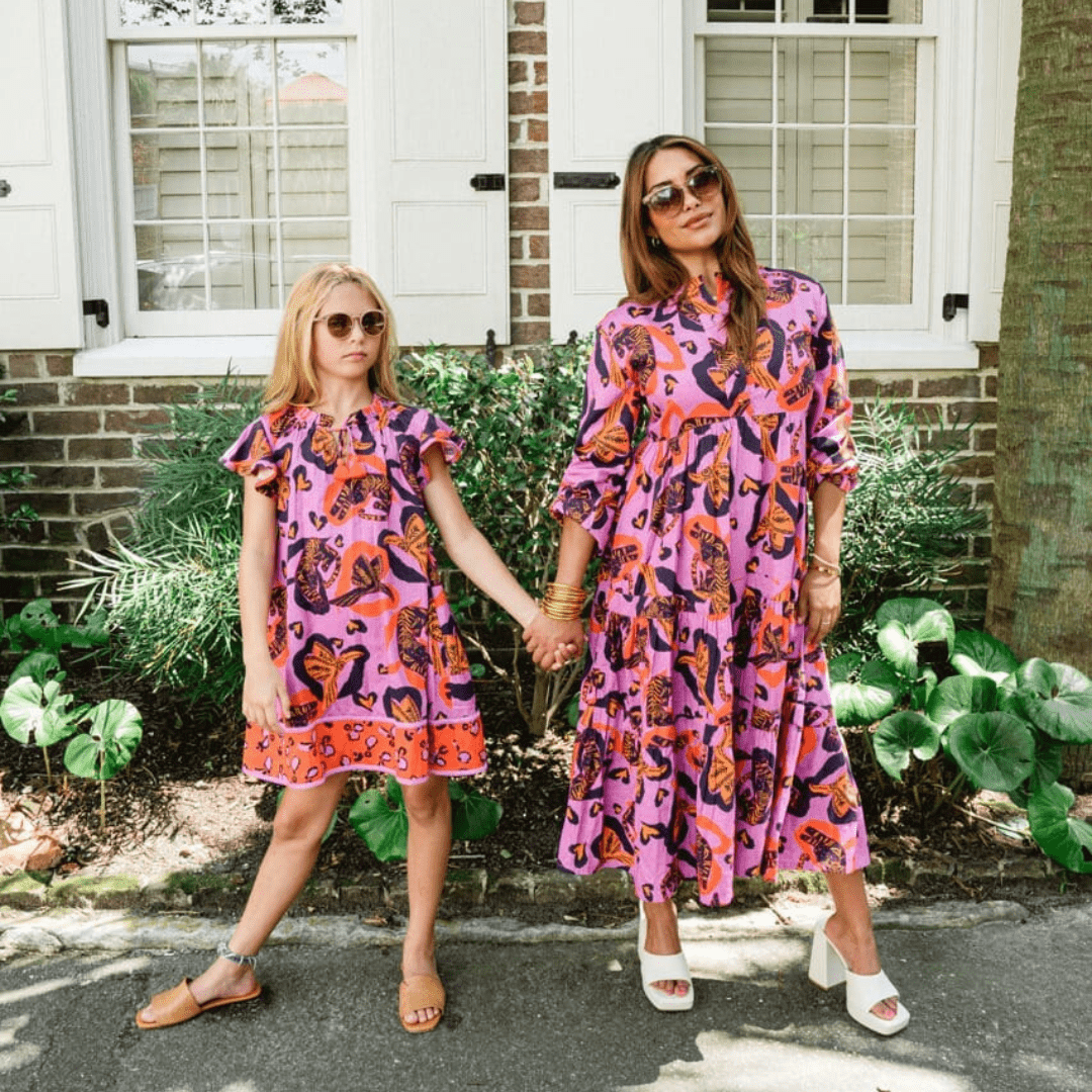 woman and girl in dresses