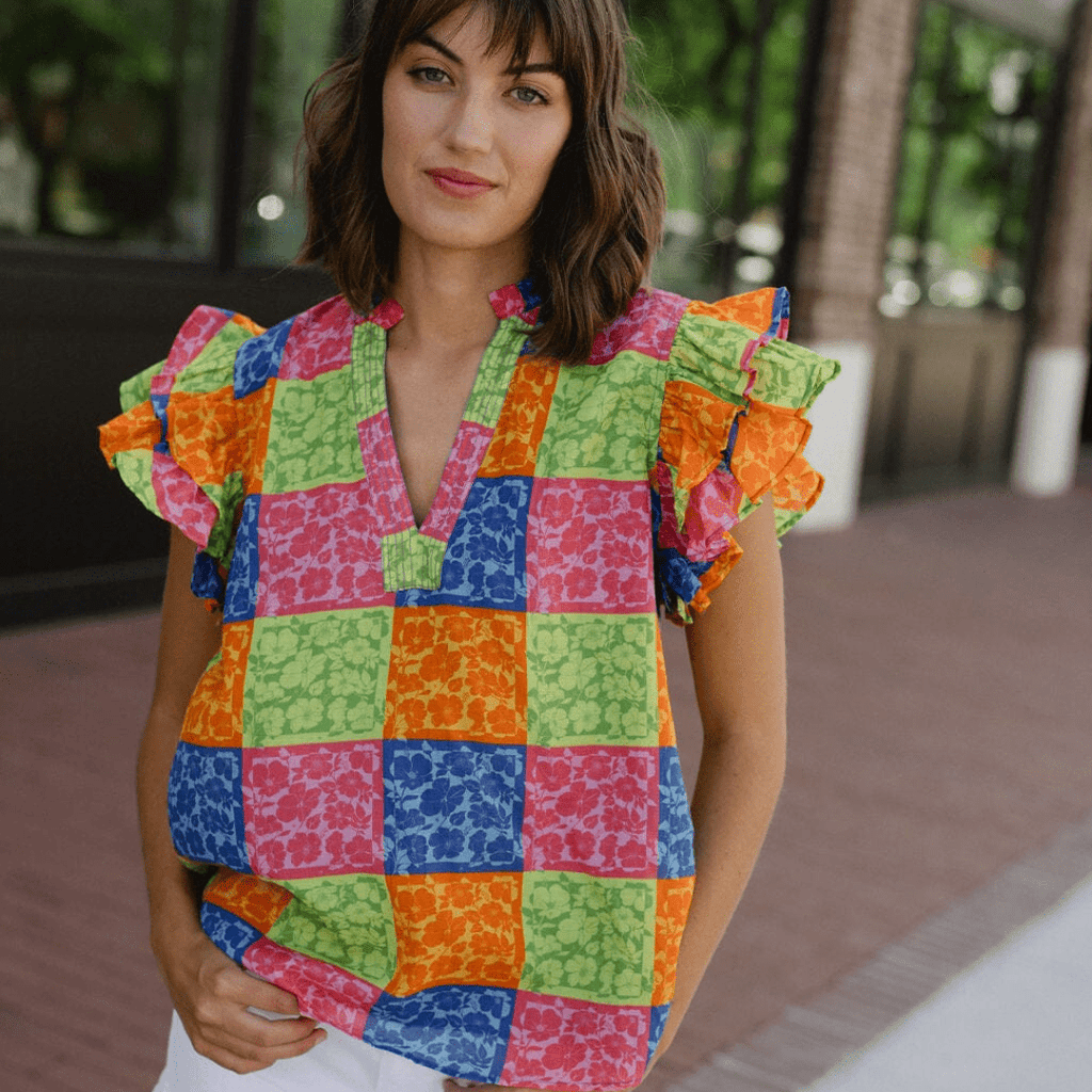 Woman in printed top - Briton Court