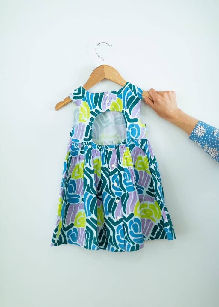 back of Aqua Wavy dress with cutout back for girls
