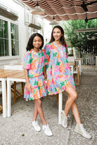 Woman and girl wearing matching Kennedy Balloon Animals dress.