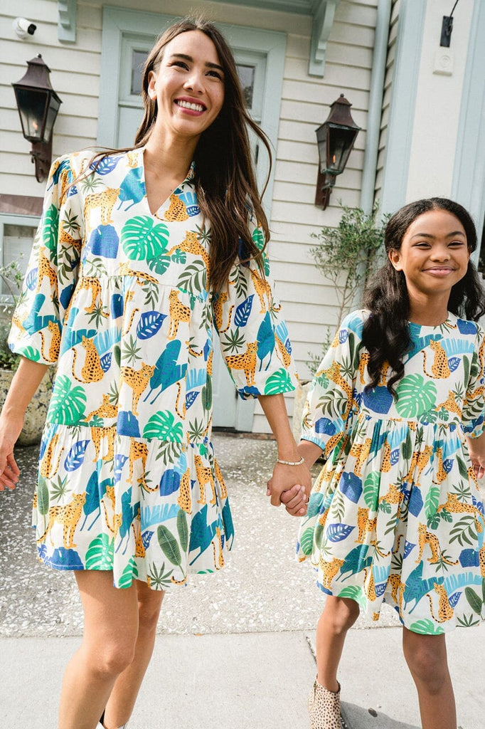 Woman and girl smiling while wearing Hattie Tropical Leaves dress.