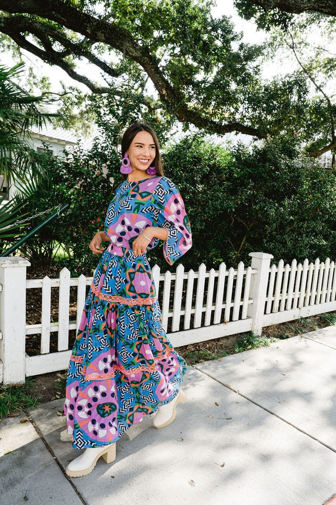 Woman smiling while wearing Kaleidoscope Embroidered maxi skirt.