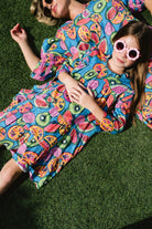 Woman and girl wearing Briton Court dress.