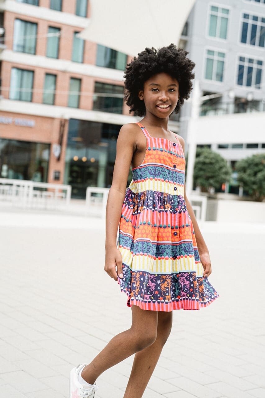 girl wearing printed dress - briton court