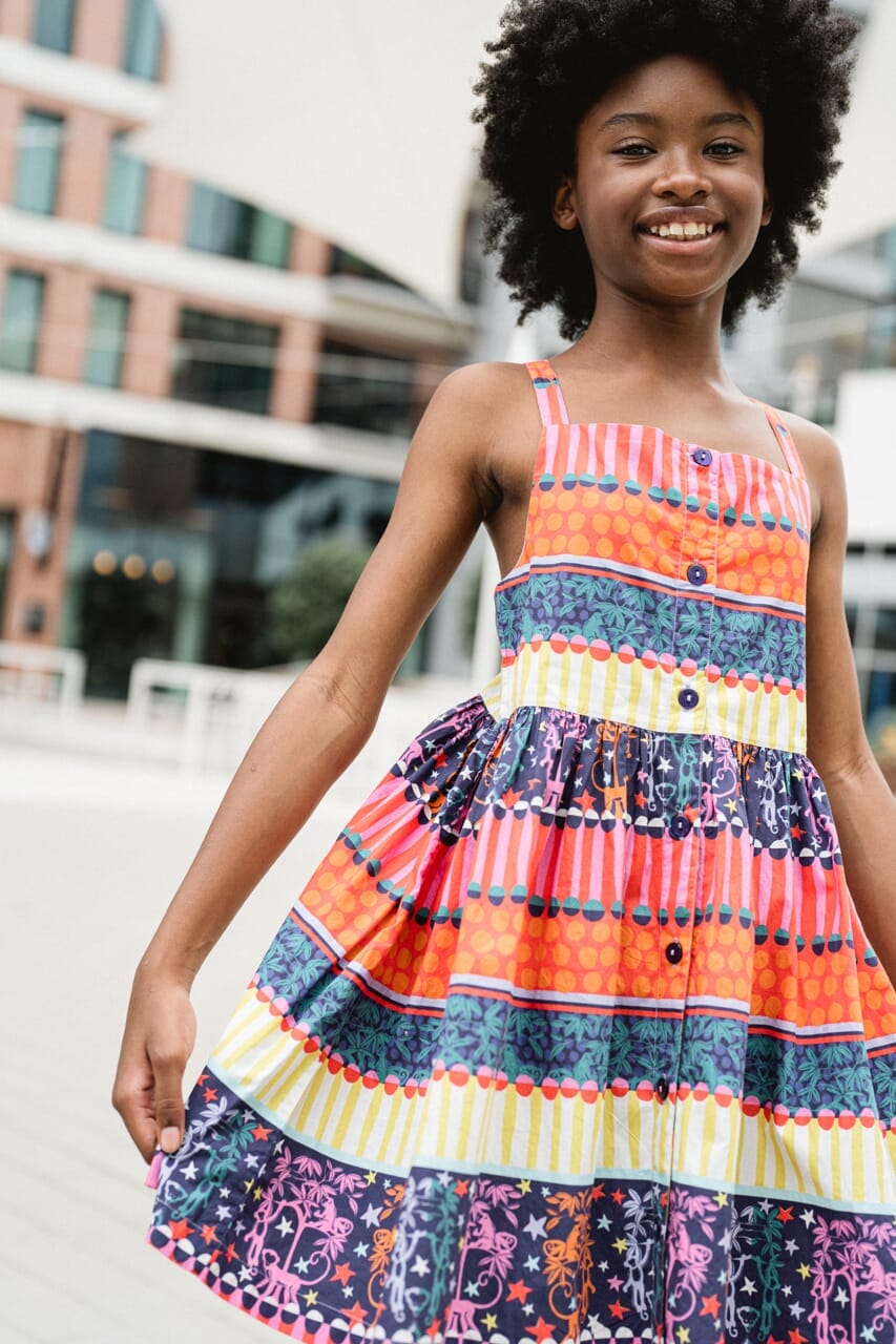 girl wearing printed dress - briton court