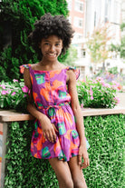 girl wearing printed top and skirt - briton court