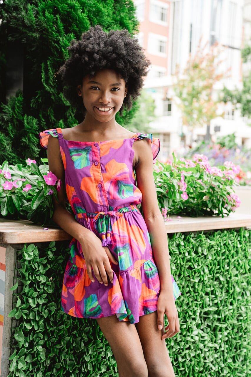 girl wearing printed top and skirt - briton court