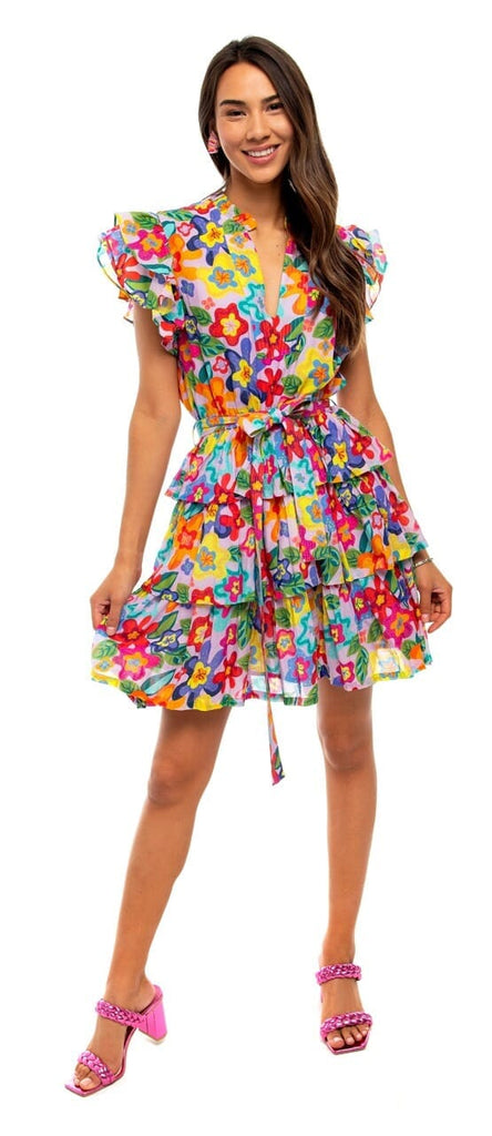 Women smiling while wearing Ruffle Floral Orchid designed dress