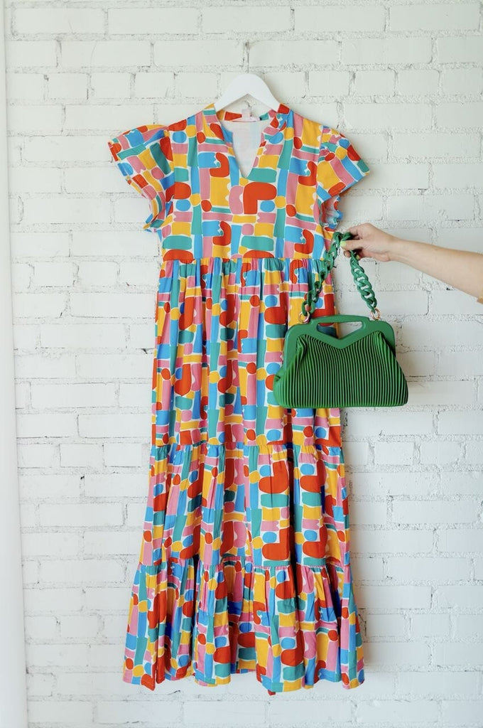 colorful maxi dress and green purse